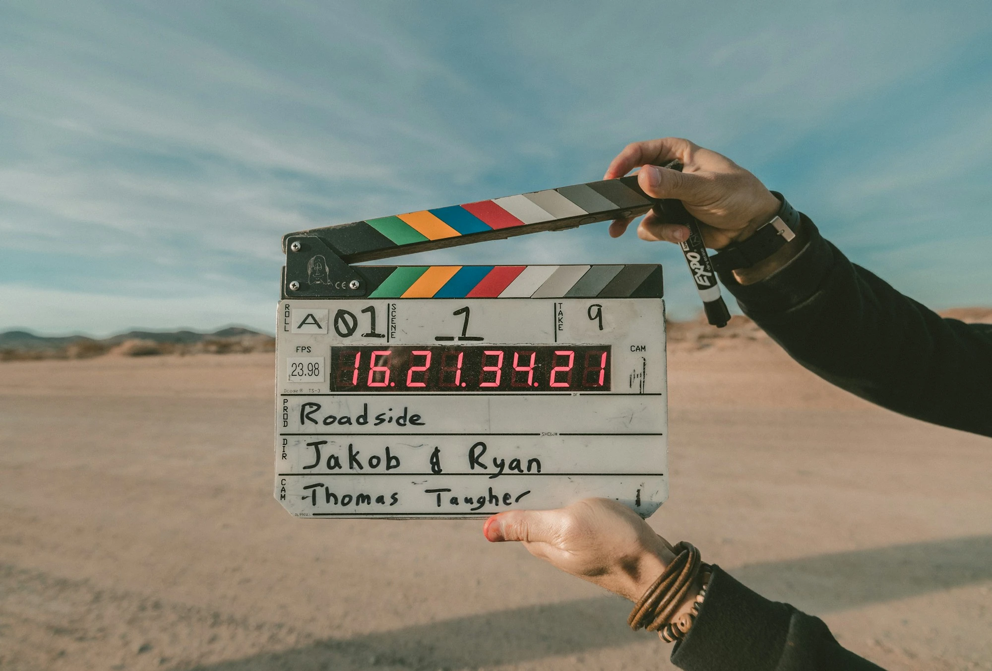 Behind-the-scenes film production clapperboard